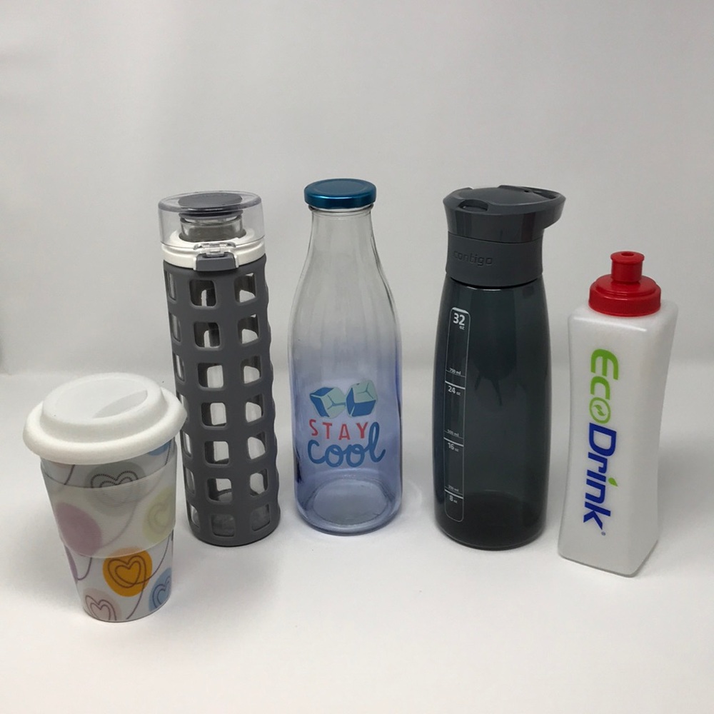 Sports drink bottles and coffee cup